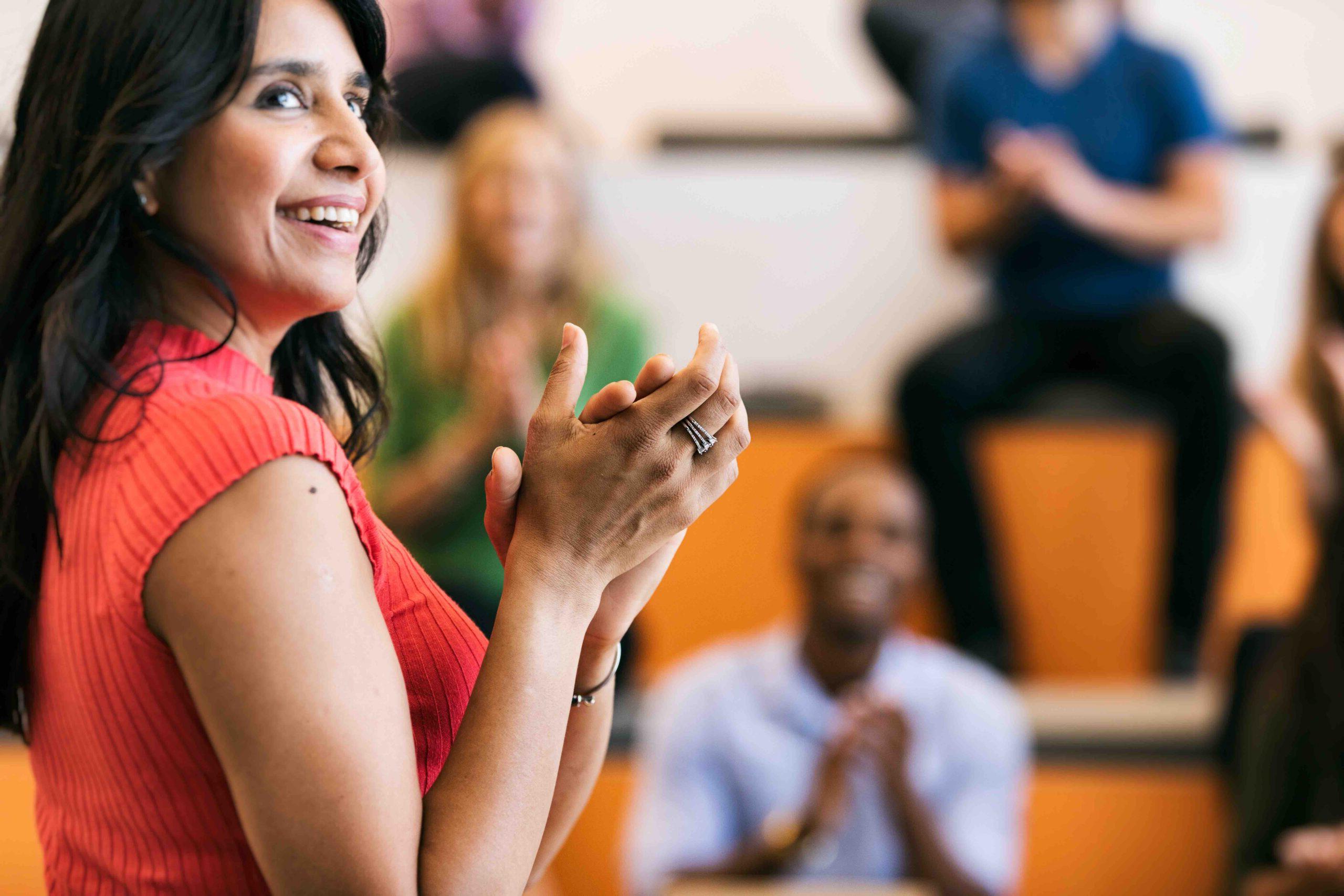 person leading a school meeting